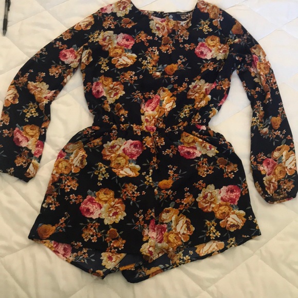 Navy Blue Floral print long sleeve romper. - Picture 1 of 5